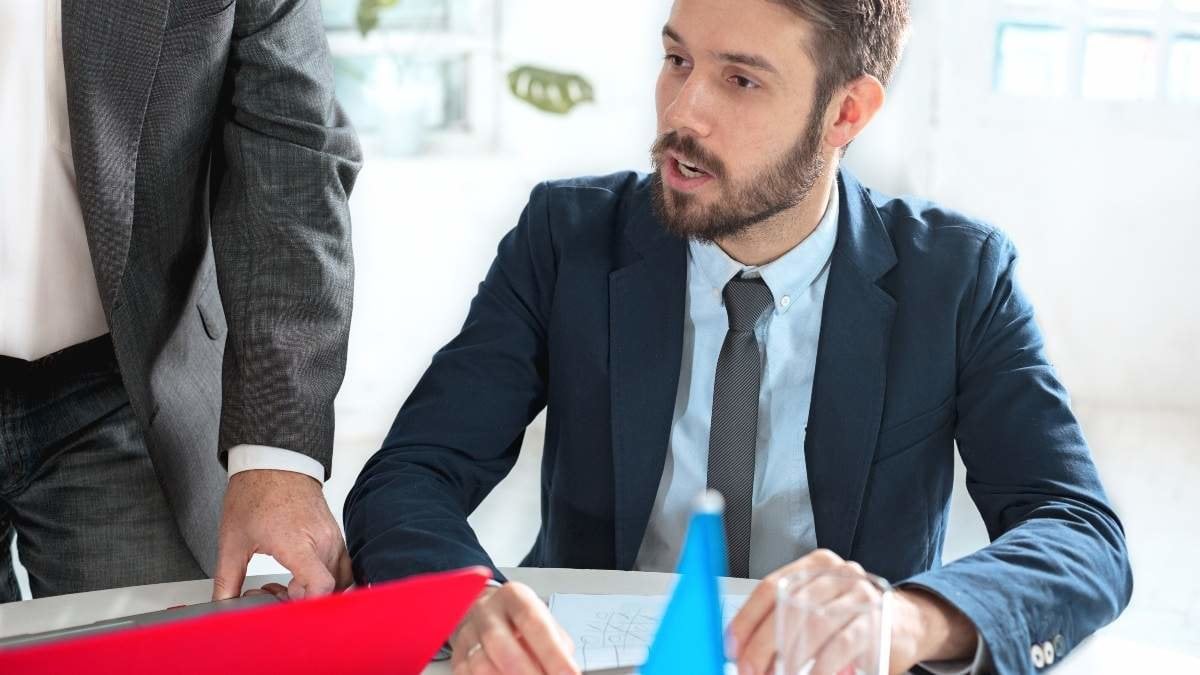 The business people working together at table. The meeting or summit concept